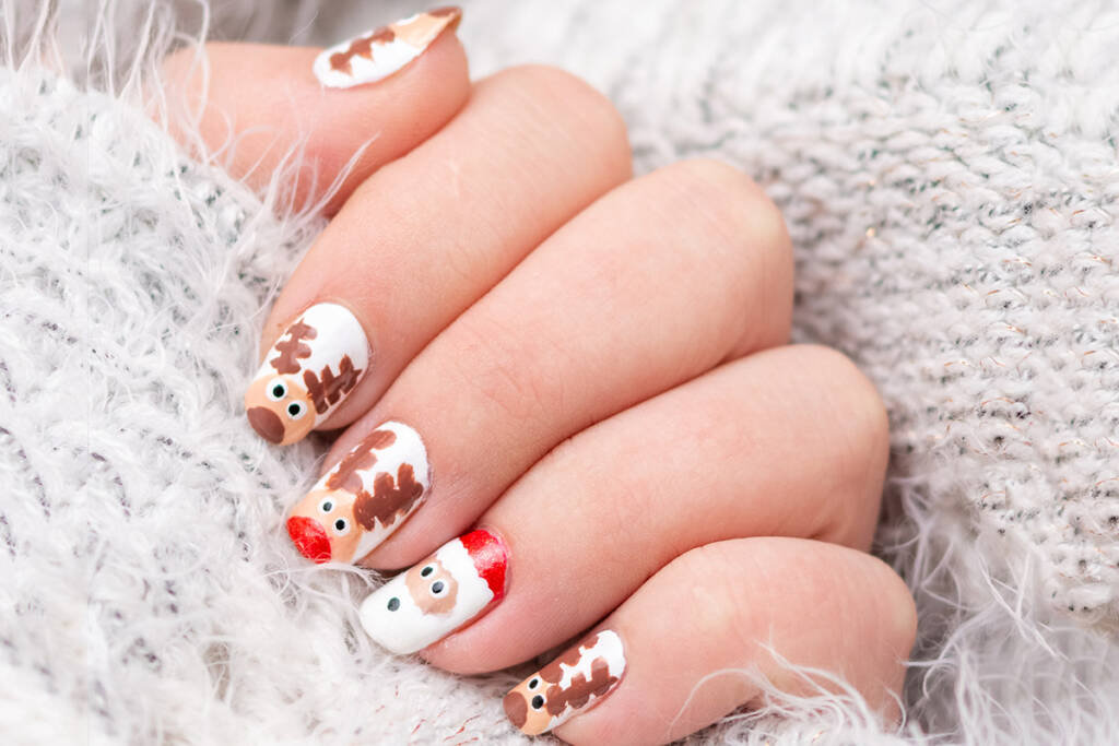 Christmas reindeer and santa claus nails