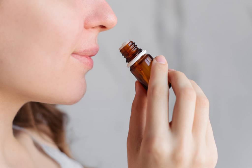 woman with essential oil