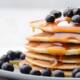 Delicious,Pancakes,Close,Up,,With,Fresh,Blueberries,And,Maple,Syrup