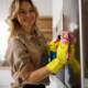 Woman,Wiping,Stainless,Steel,Refrigerator,Door,With,Rag,And,Cleaning