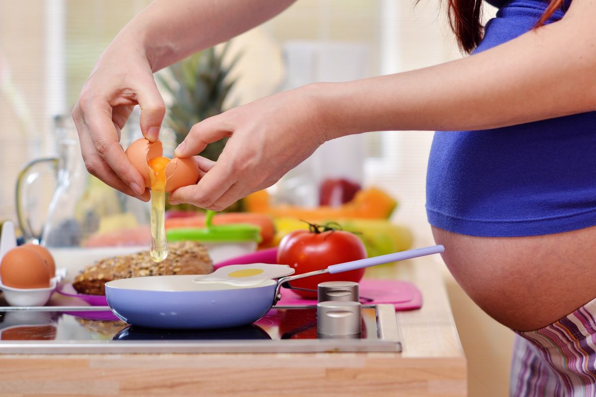 eggs pregnant woman prepares lunch