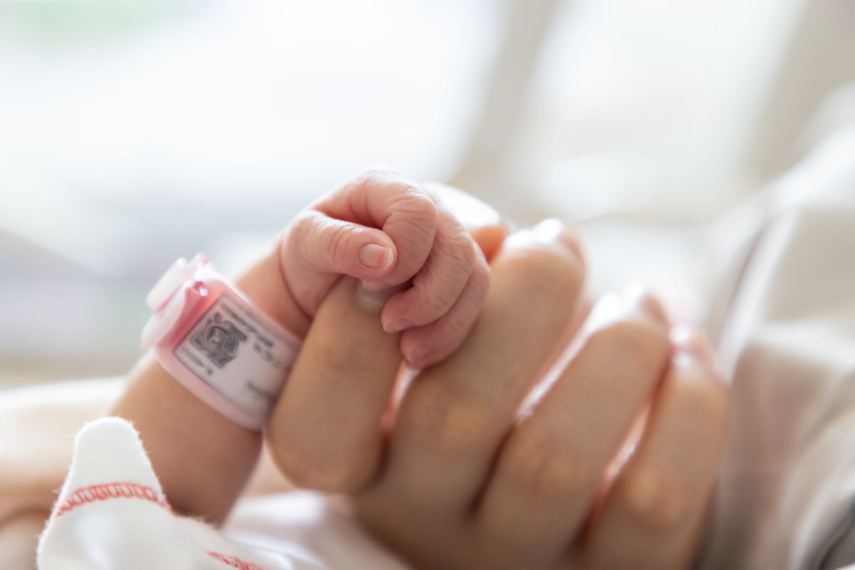 birth baby newborn newborn hands bracelet mom daughter