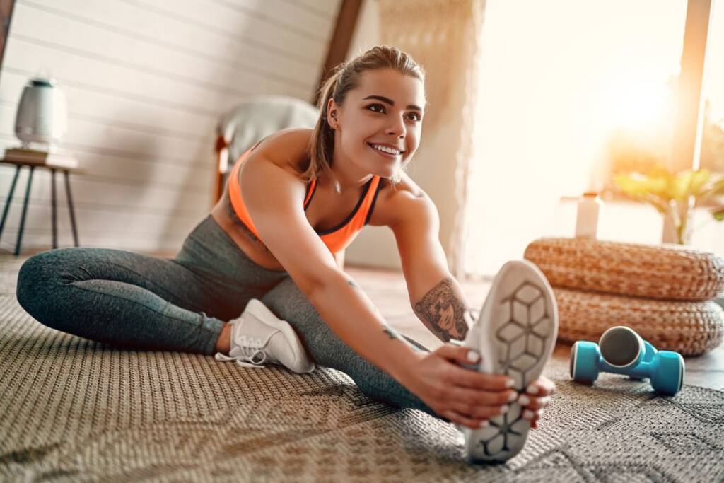 ragazza stretching gambe