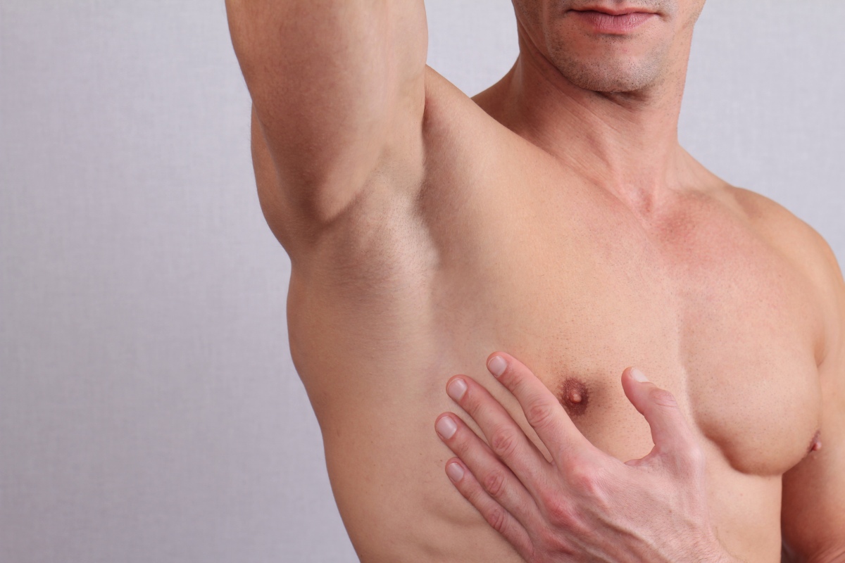 Close-up man hair removal underarms and chest